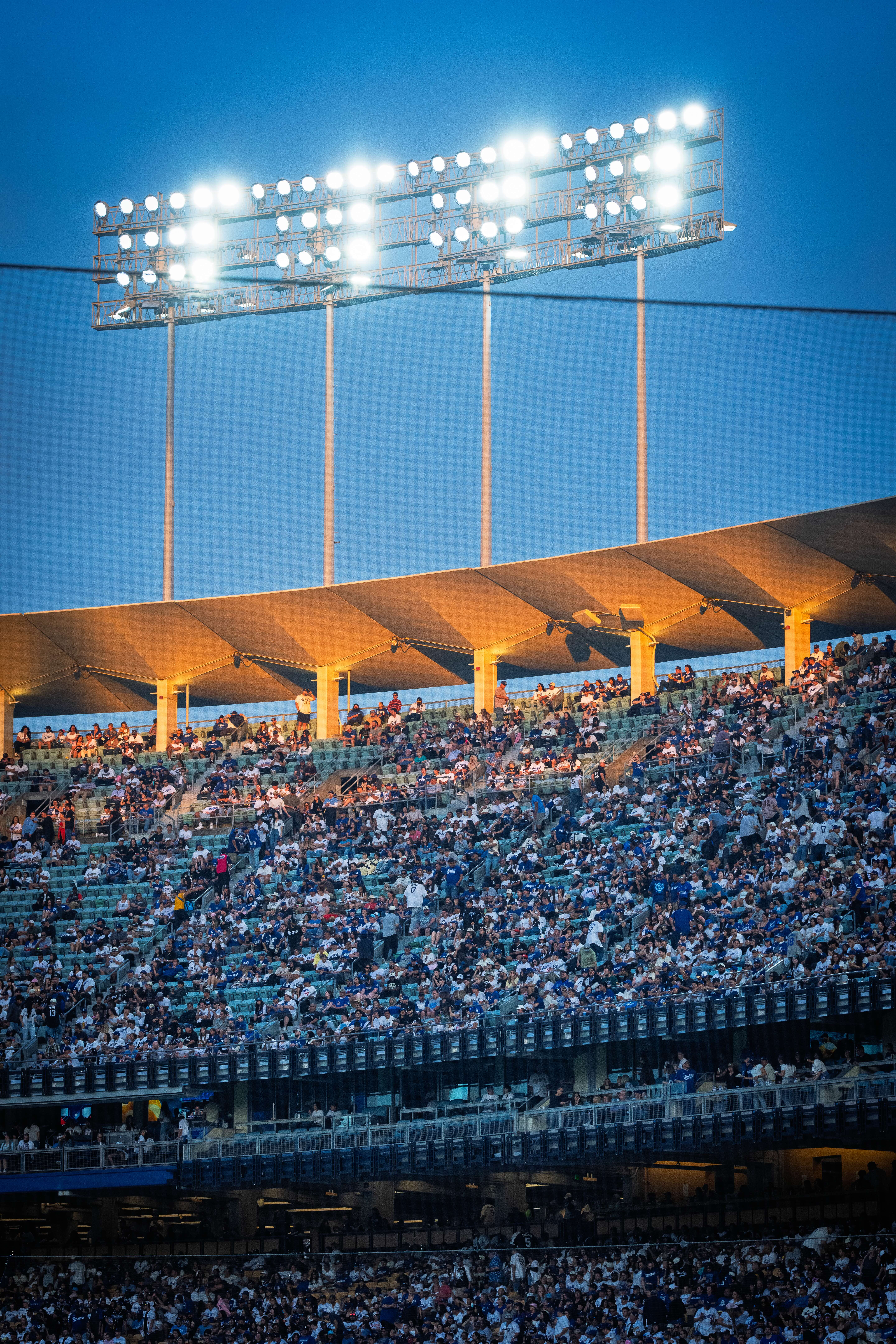 Stadium stands lit up at dusk